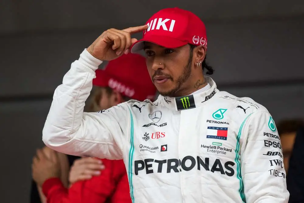 lewis hamilton wearing a hat