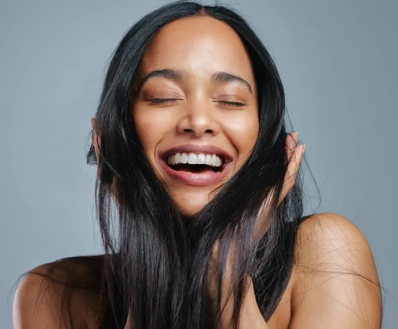 Woman holding hair